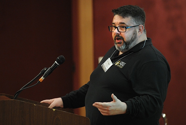 Jesuit Priest Father Bob Pecoraro, of the Christ of King Seminary, speaks to a break out group about forgiveness at the Adams Mark Hotel during day two of the 65th Annual Diocese of Buffalo Youth Convention. (Dan Cappellazzo/Staff Photographer)